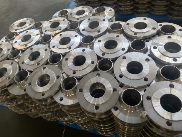 ရောင်းအားပြင်း။ DIN2632 PN10 RF Weld Neck Flange ကာဗွန်သံမဏိ A105 S235JR မှာယူမှုမှကြိုဆိုပါတယ်။